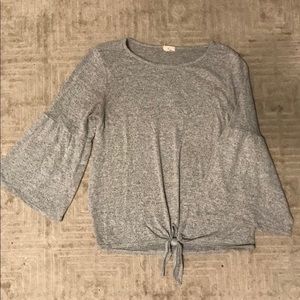 Gray bell sleeve top with knot hem